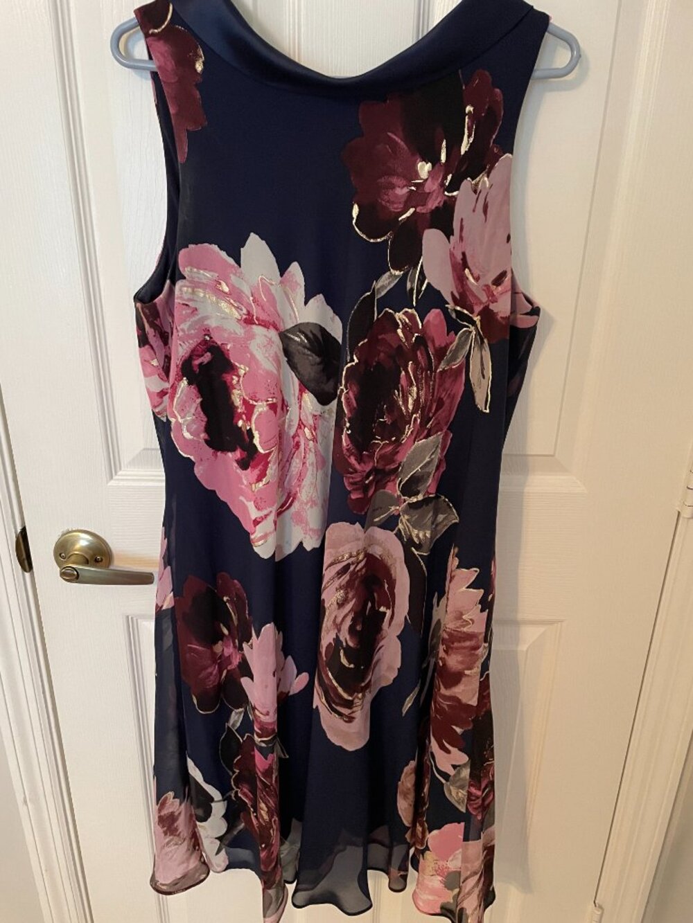 Beautiful navy dress w floral accents gold highlights. Size 14.